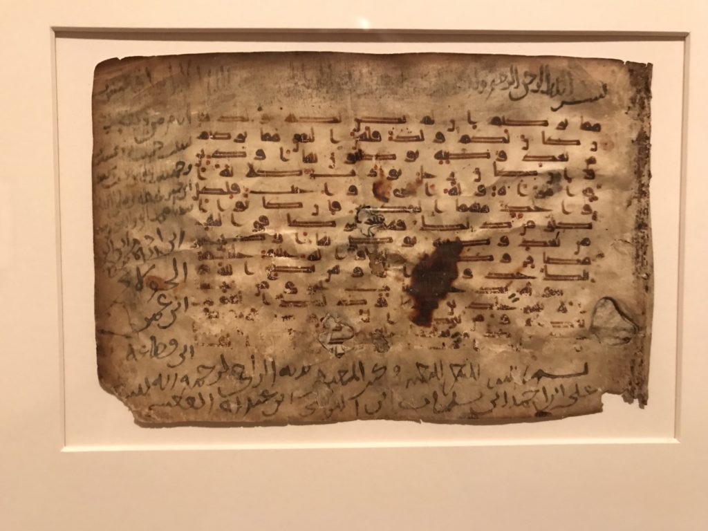 This historic page shows the second phase in the development of the Arabic script that uses red dots. The position of the point above, below or in front of a character symbolizes the more modern accents. These accents represent the vowel sounds. Qur’anic verses 
